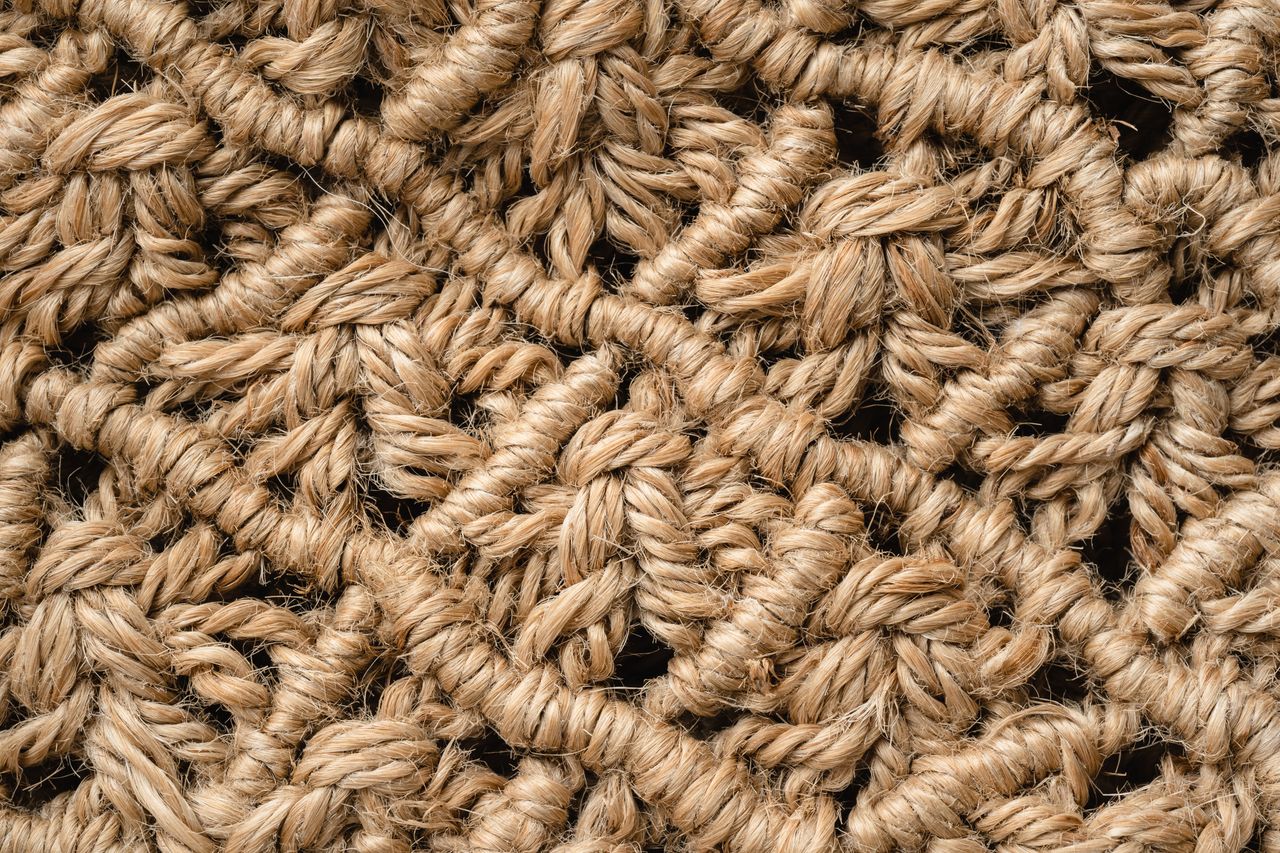 Tela de fibra natural tecida — close-up da estrutura de uma biomanta
